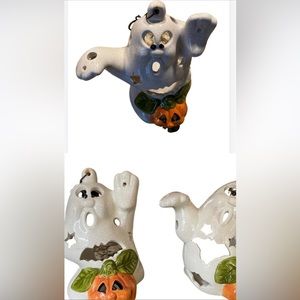 Three ghost tea light holders